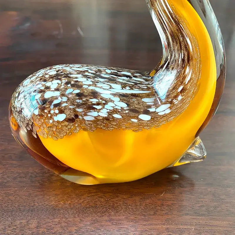 Hand blown glass sika deer figurine in vibrant yellow with speckled pattern, amber living room decor piece