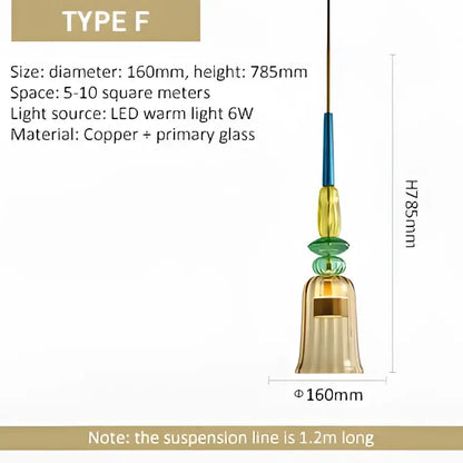 A hanging glass pendant light with copper and hand blown yellow and green textured glass segments for kitchen accent