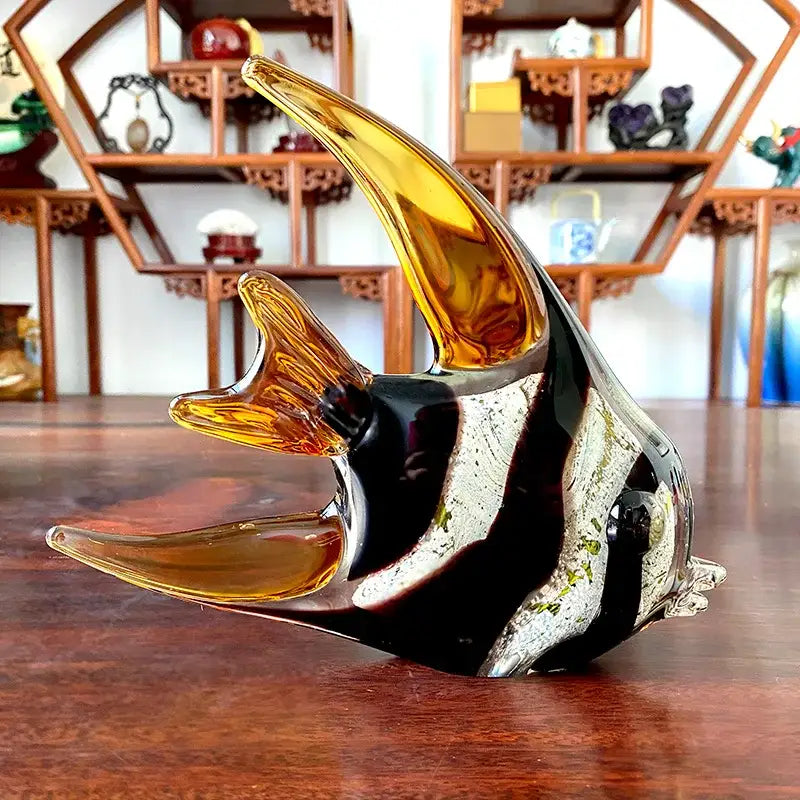 Hand blown tropical glass figurine of a glossy angel fish with amber fins and black stripes for living room decor