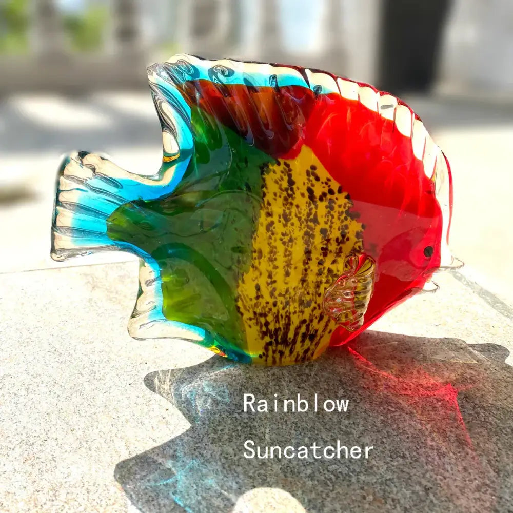 Hand blown tropical glass figurines featuring a vibrant multicolored blown tropical fish for living room decor