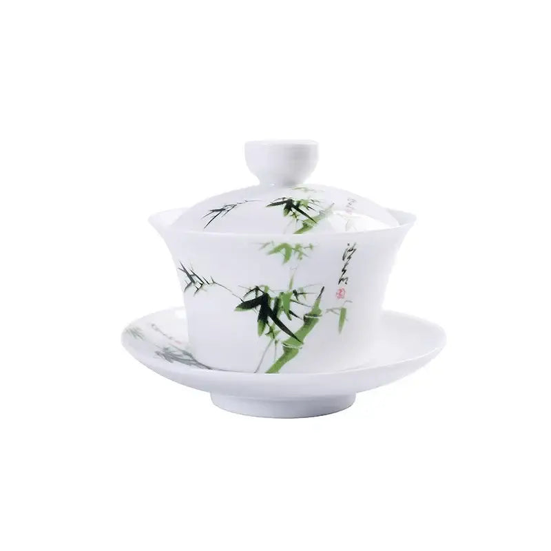 White porcelain gaiwan with hand-painted green bamboo and black ink brushwork and matching saucer by decorbites blue