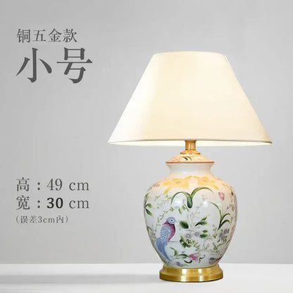 Hand-painted coral flower bird ceramic table lamp with white base and gold trim, ideal for living room decorbites coral flower decor