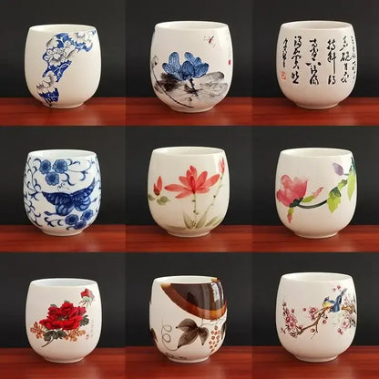 Hand-painted floral white porcelain kung fu tea cup with vibrant blue red pink and brown decorbites ceramic kung designs
