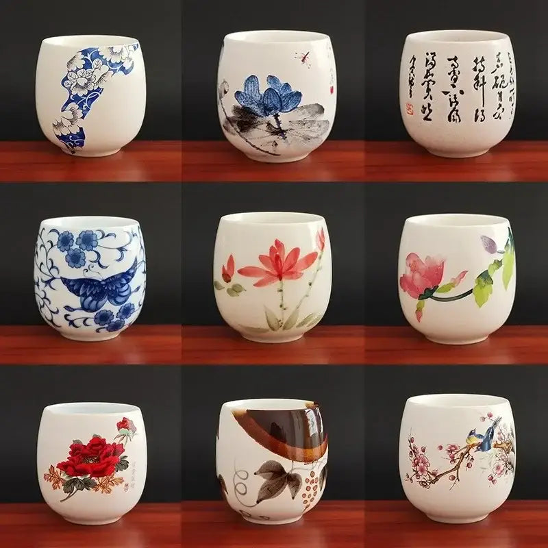 Hand-painted floral white porcelain kung fu tea cup with vibrant blue red pink and brown decorbites ceramic kung designs