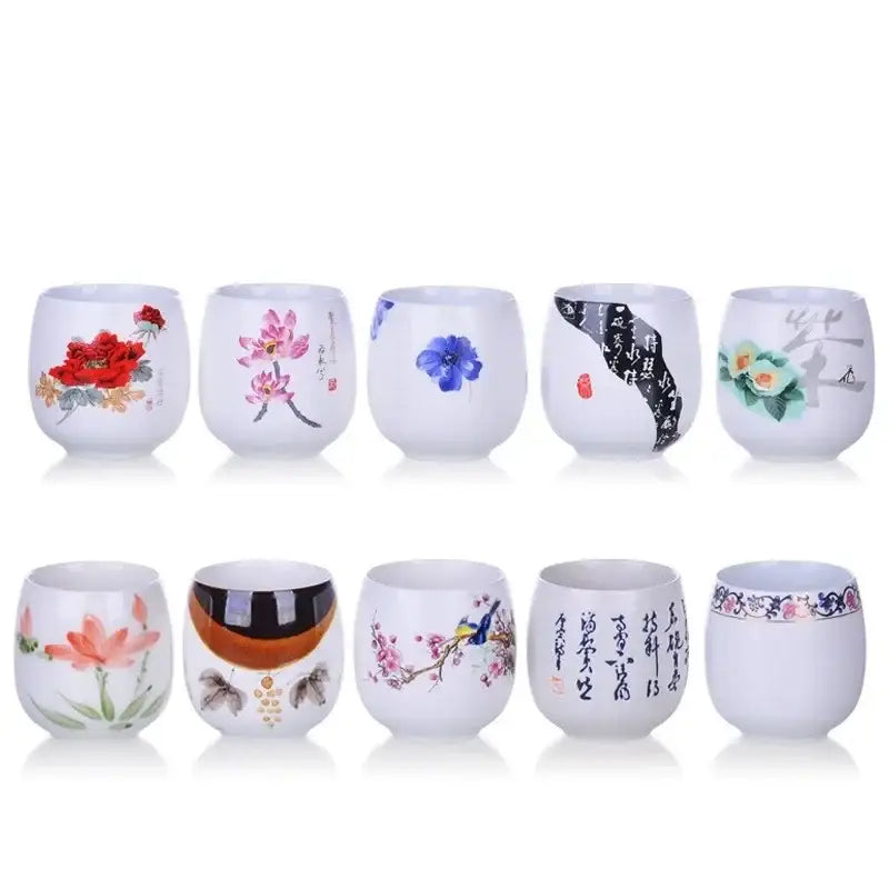Set of ten hand-painted floral white porcelain kung fu tea cups with vibrant ceramic kung designs for dining room decor