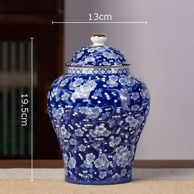 Blue and white hand-painted floral white porcelain tea canister with gold accents for kitchen storage