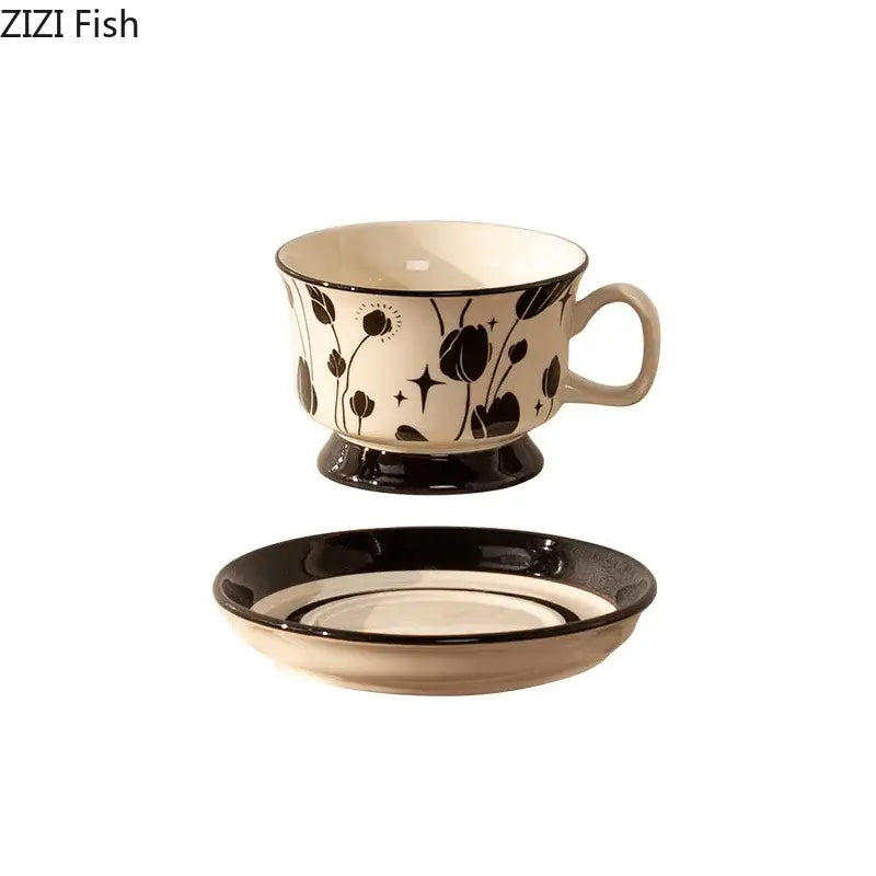 Cream-colored hand-painted flowers pattern ceramic cup and saucer set with black decorbites flowers pattern details for dining room