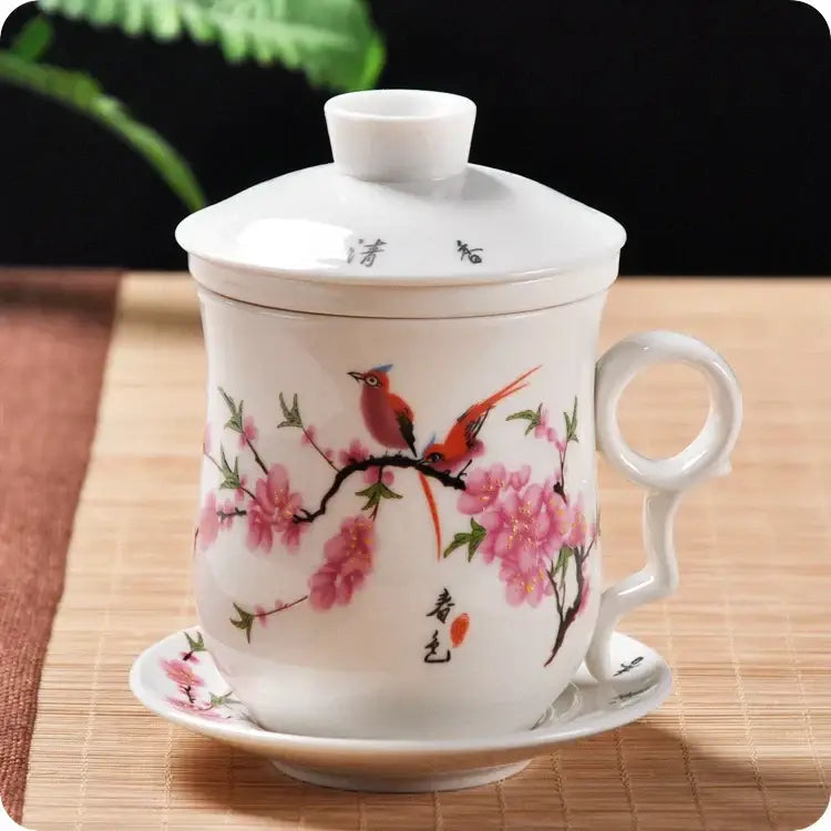 Hand painted lotus white porcelain tea cup with lid and saucer featuring black and white landscape art and subtle red details