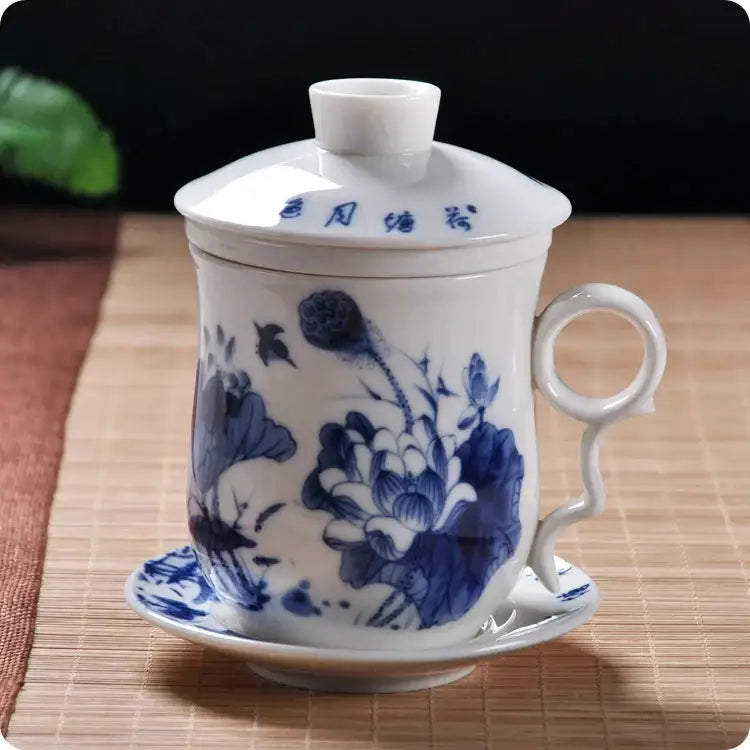 Hand painted lotus white porcelain tea cup with filter featuring blue floral patterns for dining room use