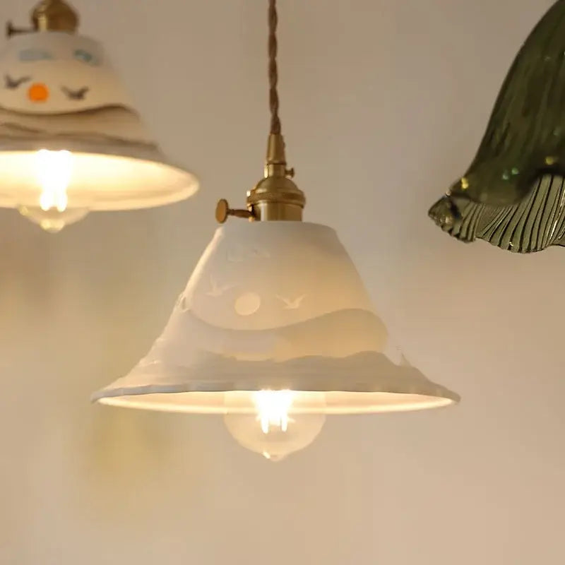 Hand painted white ceramic copper pendant light with frosted bell shade and etched bird and moon designs decorbites ceramic copper pendant