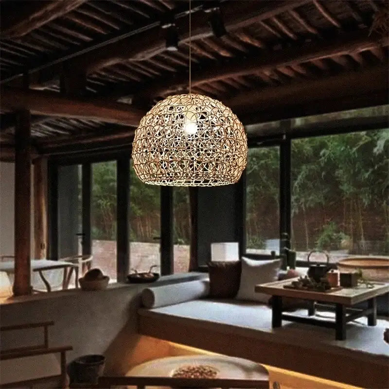 Hand woven rattan spherical pendant light with warm glow for modern living room chandelier, woven rattan pendant design