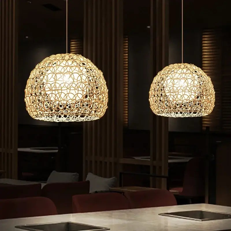 Warm-toned hand woven rattan pendant lights with spherical design for modern living room chandelier lighting