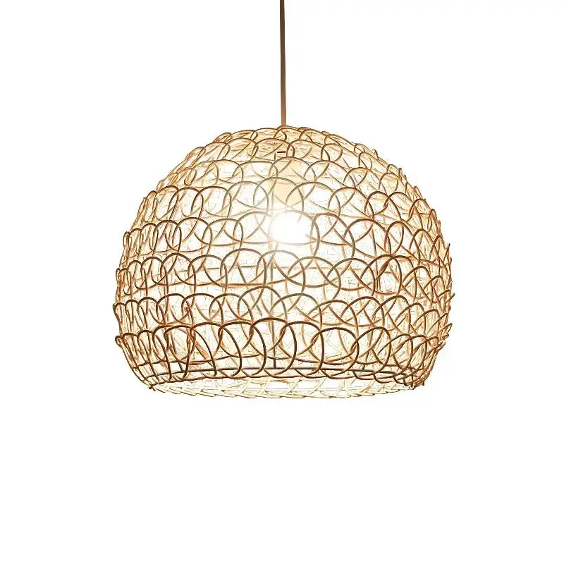 A warm-toned spherical hand woven rattan pendant light with intricate woven wire design for modern living rooms