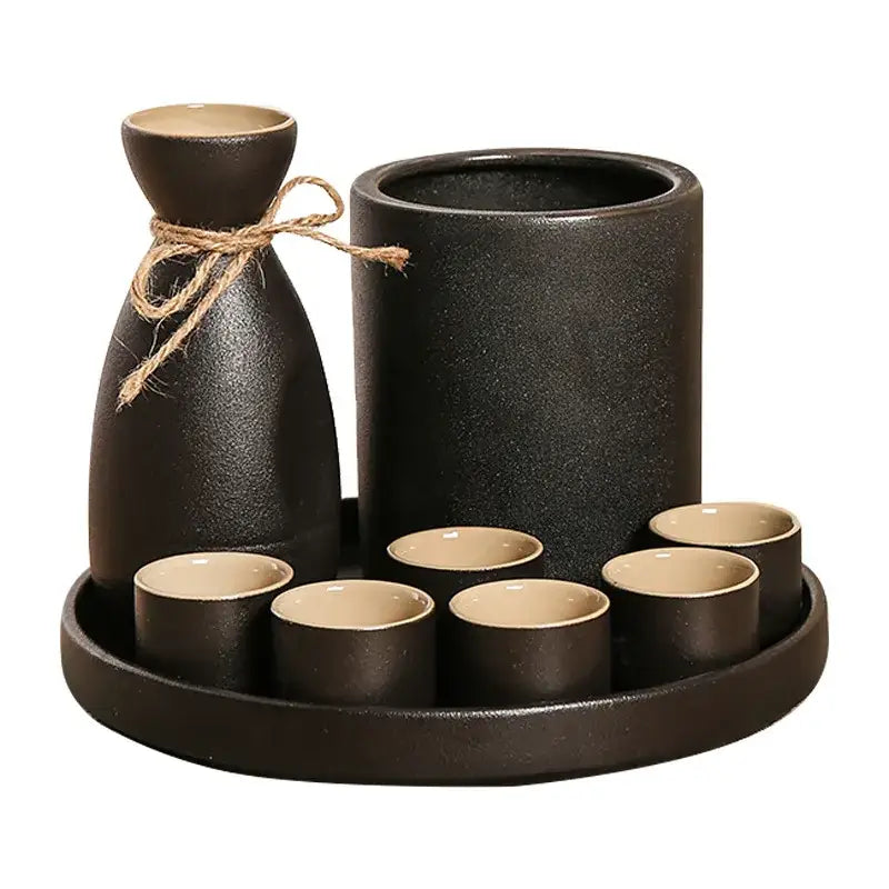 Handcrafted black ceramic wine warmer sake set with matte finish featuring bottle tied with twine and six cups on tray decorbites black ceramic