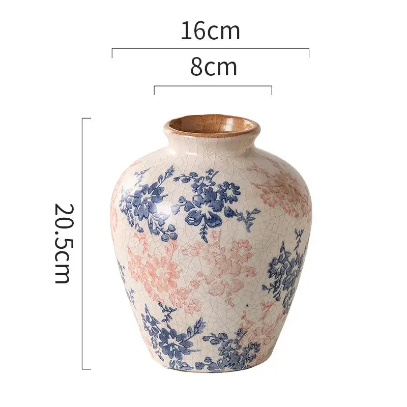 Handcrafted white ceramic vase with crackled cream glaze and blue pink floral patterns for living room decorbites decor
