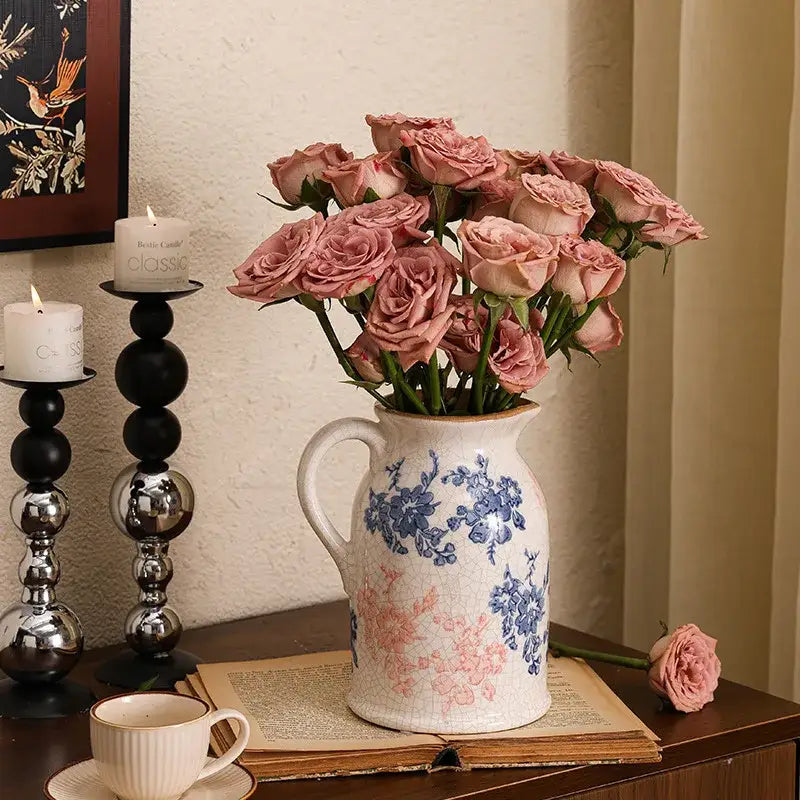 Handcrafted white ceramic vase with blue and pink floral pattern and crackled glaze for decorbites blue living room decor