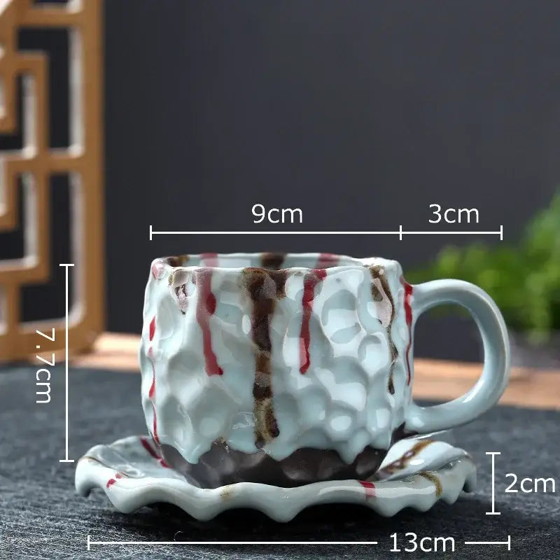 Handcrafted light blue and red textured hammer pattern ceramic mug set with matching saucer for dining room use