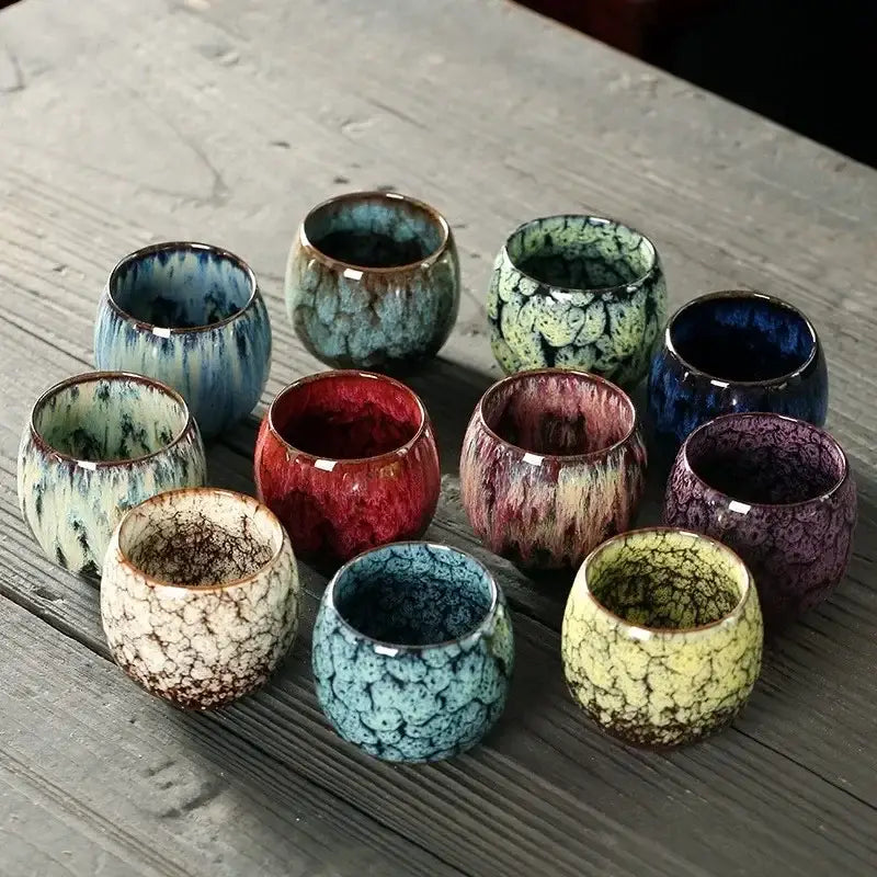 Handcrafted colorful egg style ceramic tea cup set with unique crackled glaze in red blue green and yellow for dining room