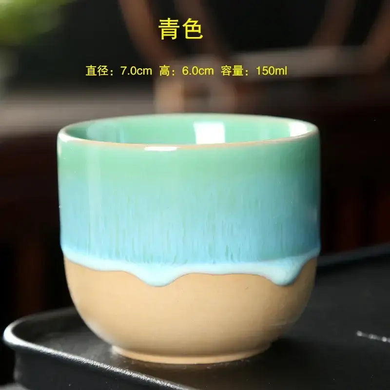 A handcrafted ceramic kung fu tea cup with a gradient glaze from light teal to pale blue and a beige base perfect for dining room decorbites ceramic kung set