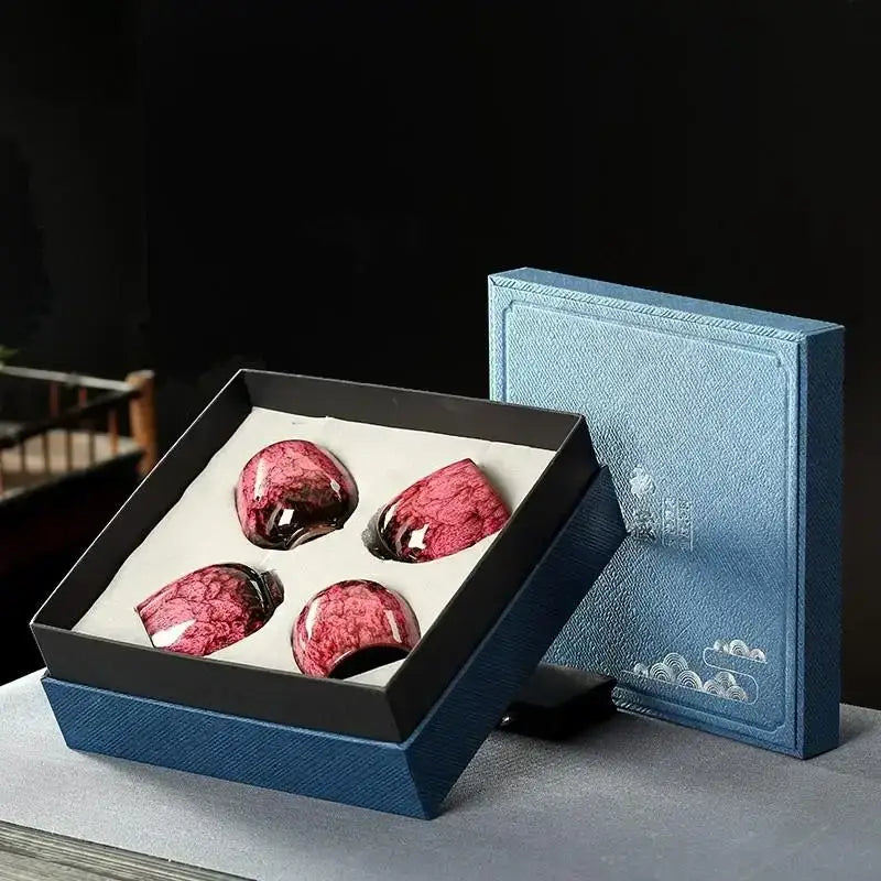 Four glossy red handcrafted ceramic cups set with marbled texture in a black box for dining room tea decorbites ceramic cups