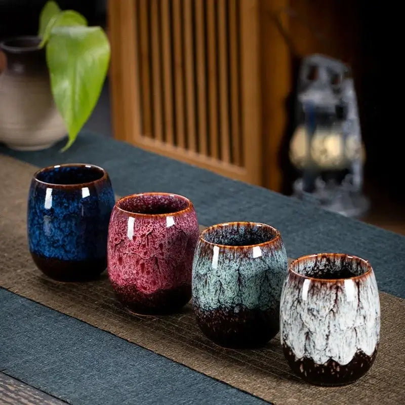Handcrafted multicolored ceramic tea cup set with glossy crackled glaze in blue red teal and white for dining use