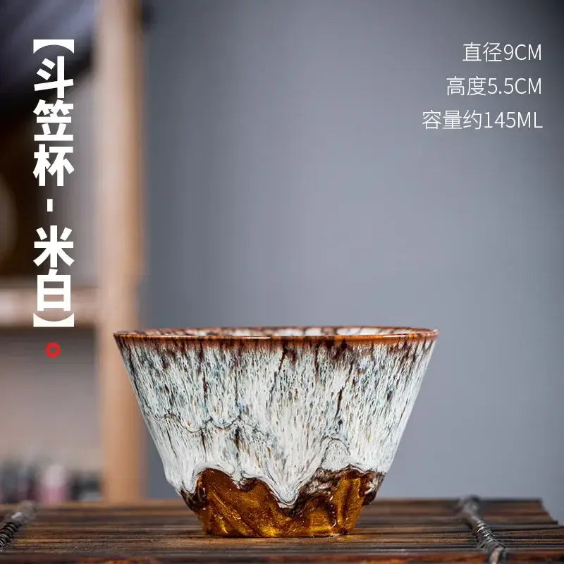 Handcrafted ceramic tea cup set featuring a white and brown textured glaze for dining room drinkware use