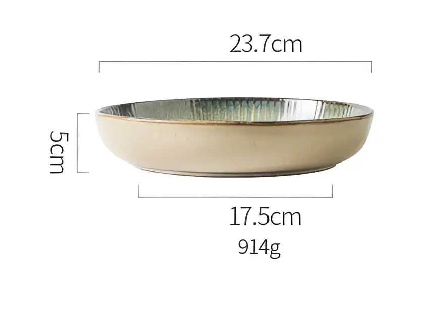 Beige handcrafted decorbites ceramic dessert plate with textured speckled green rim and smooth curved interior for dining room