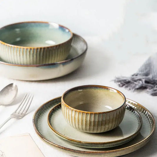 Handcrafted decorbites ceramic dessert plate with vertical ridges in sage green cream and earthy brown tones