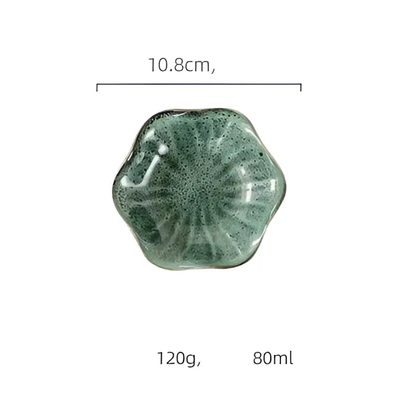 Handcrafted scalloped hexagonal decorbites ceramic japanese style dipping bowl with speckled green glaze and radial ridges