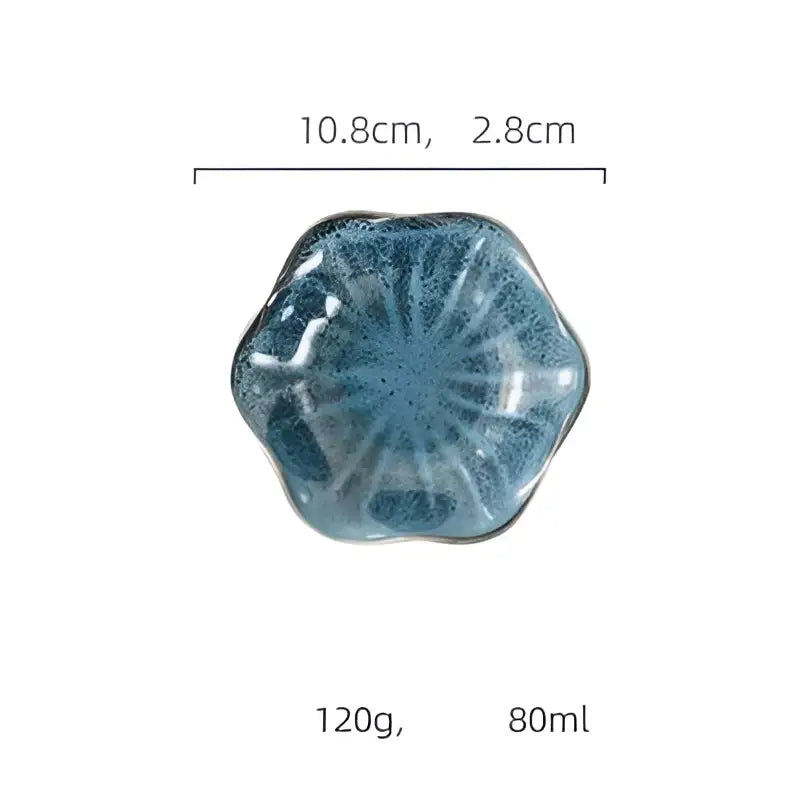 Handcrafted scalloped ceramic japanese style dipping bowl with speckled blue glaze and petal-like ridges decorbites ceramic japanese
