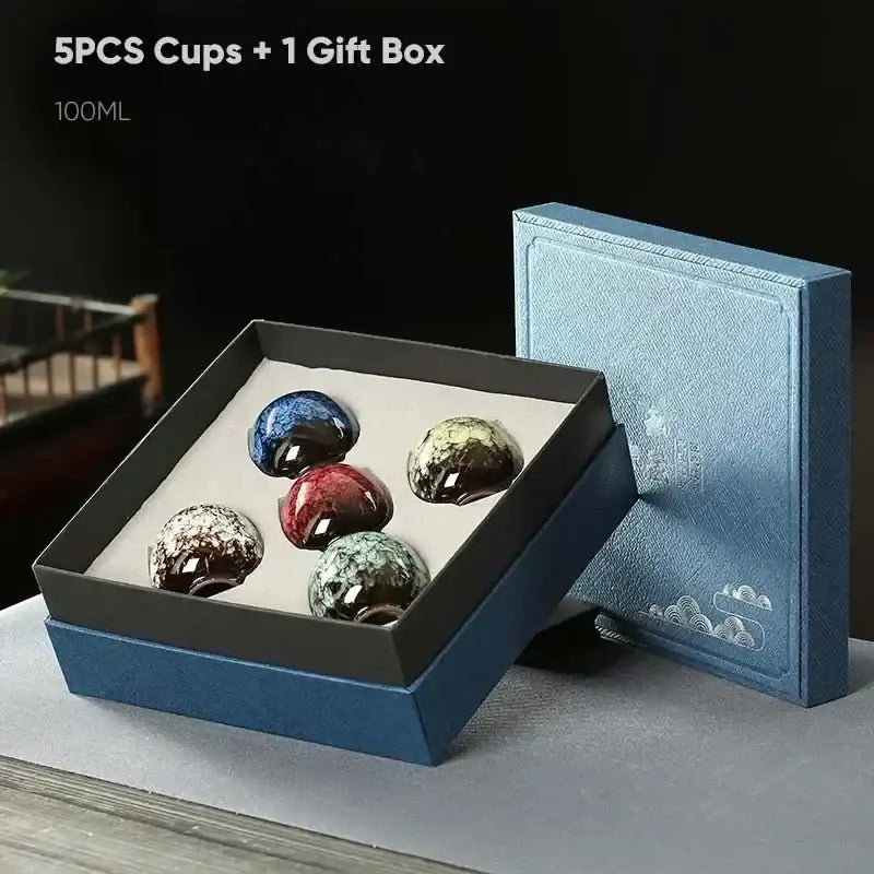 Set of five handcrafted vibrant ceramic cups with unique glazes in a luxurious blue decorbites ceramic cups gift box