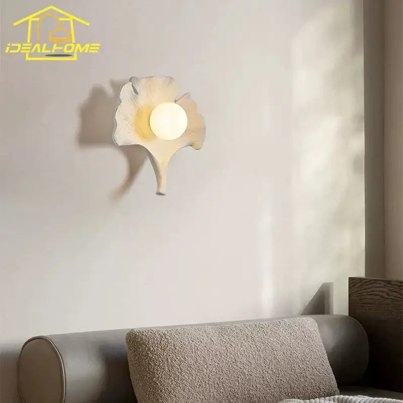 Handcrafted minimalist white ginkgo biloba resin wall lamp with frosted glass globe bulb for bedroom decorbites wall lamp