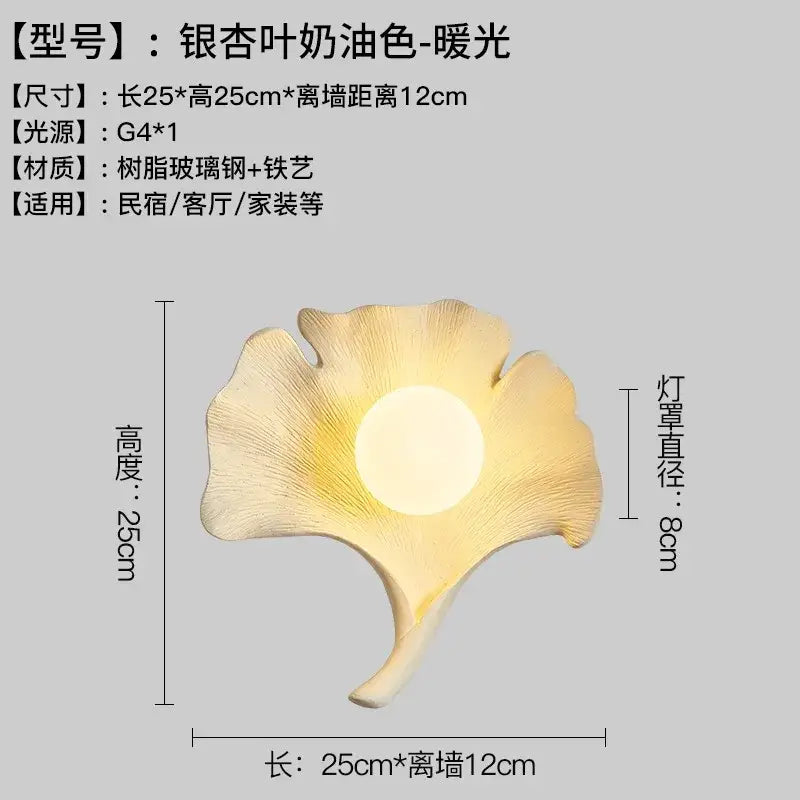 Handcrafted wooden ginkgo biloba resin wall lamp in warm creamy golden color for bedroom decor by decorbites ginkgo biloba