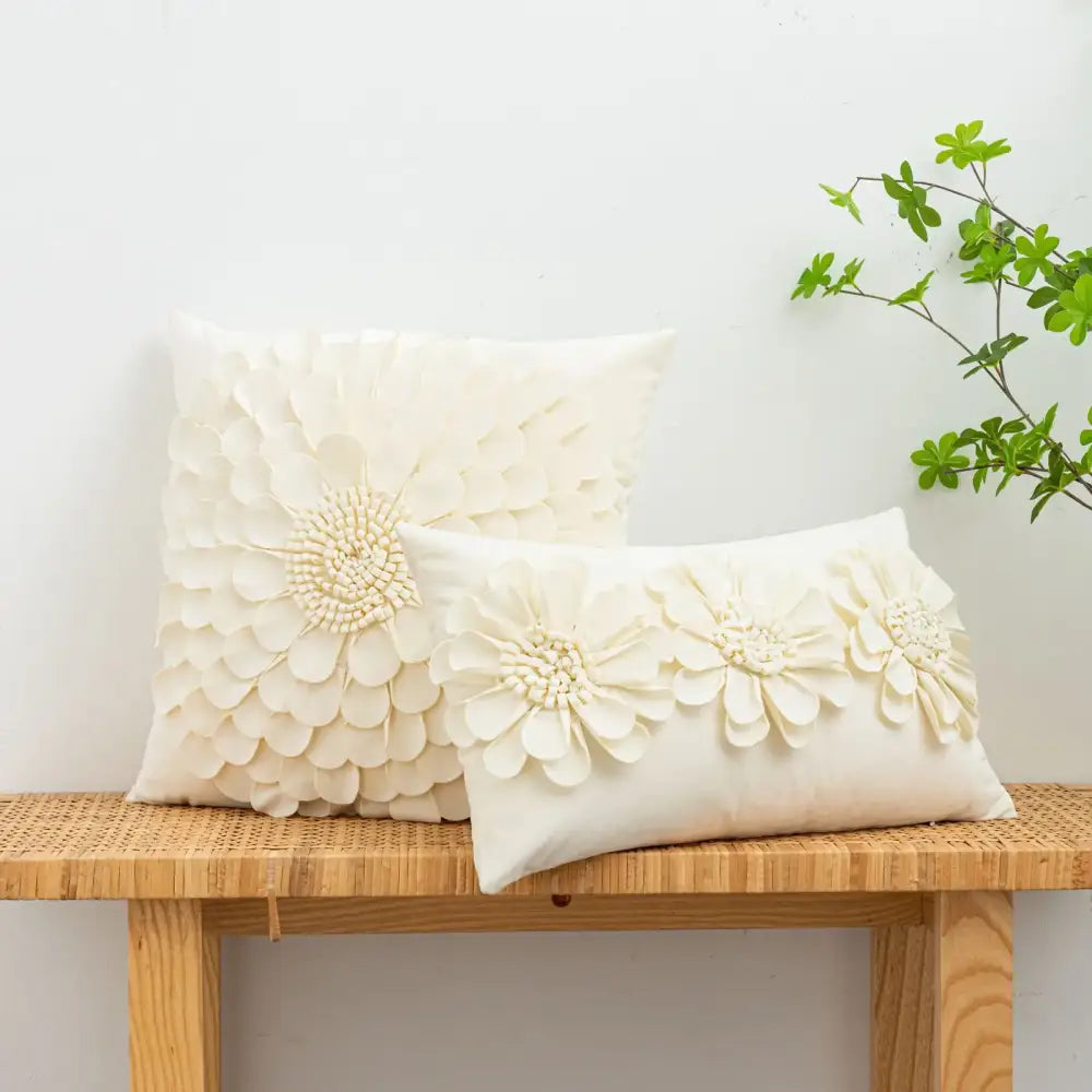 Cream-colored handmade 3d chrysanthemum flower cushion cover with layered floral appliqués in soft textured fabric