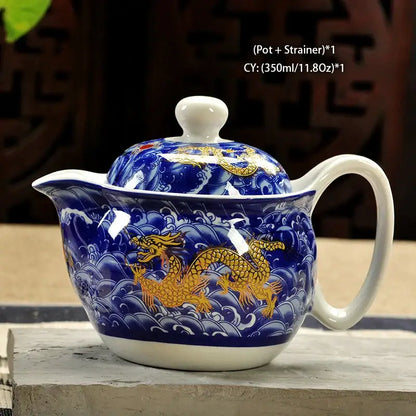 Handmade decorbites ceramic kung fu teapot featuring blue and gold dragon design with white porcelain lid handle and base