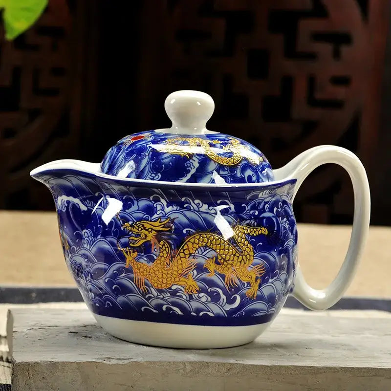 Handmade decorbites ceramic kung fu teapot with blue and gold dragon designs and white ceramic accents for dining room decorbites ceramic kung