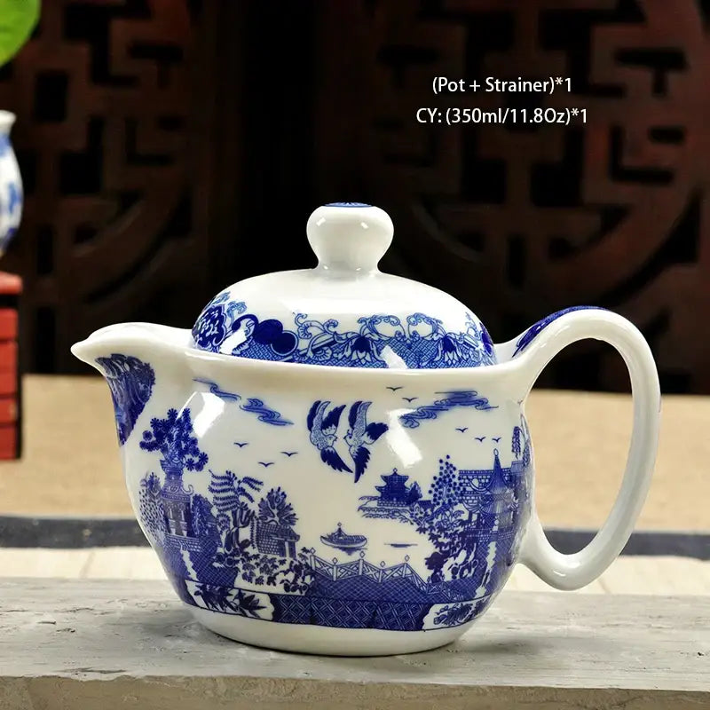 Handmade blue and white decorbites ceramic kung fu teapot with detailed landscape design for elegant dining room use