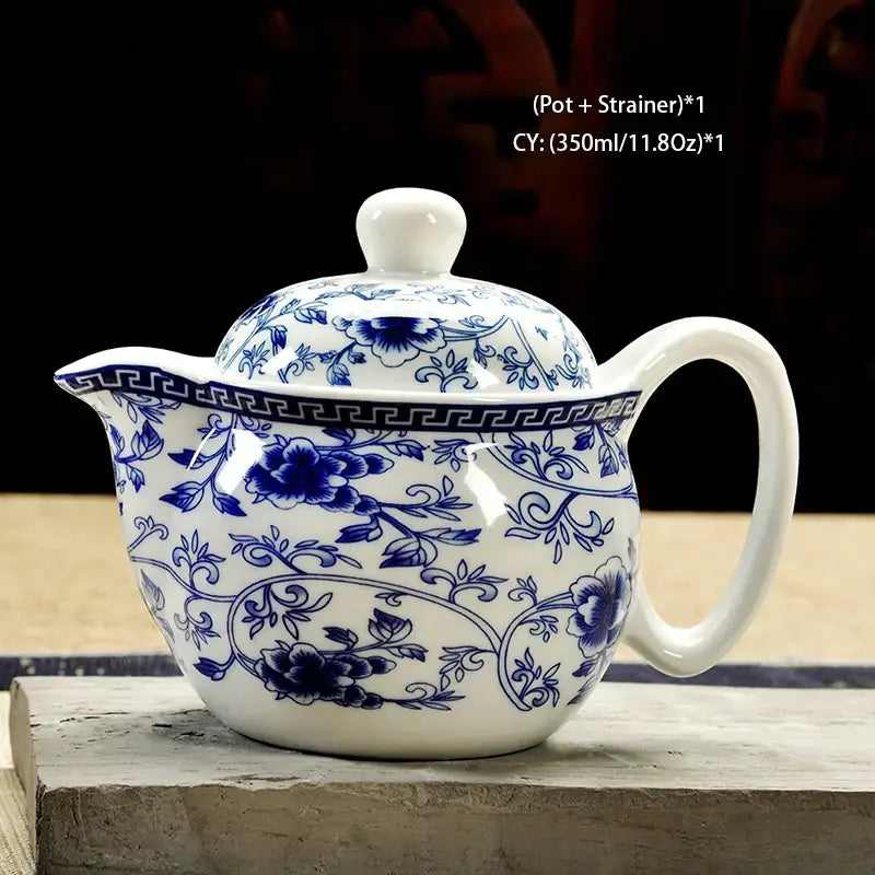 Handmade white ceramic kung fu teapot with blue floral vine patterns by decorbites ceramic for dining room tea decor