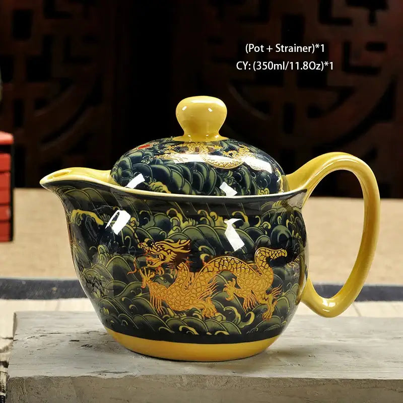 Glossy black ceramic kung fu teapot with golden dragon motifs and yellow accents by decorbites ceramic kung