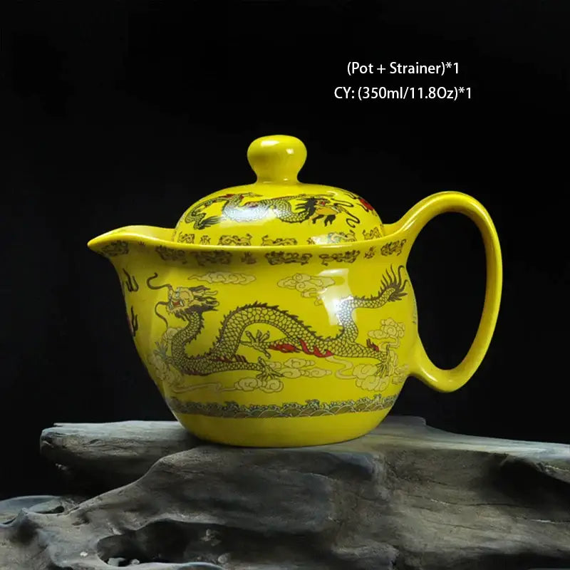 Vibrant yellow handmade decorbites ceramic kung fu teapot with golden red dragon motifs and matching lid and strainer