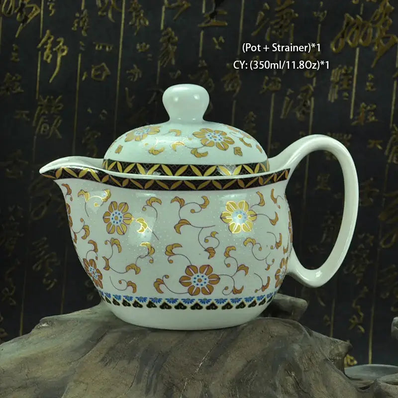 Handmade decorbites ceramic kung fu teapot in white with gold brown floral patterns and blue decorative bands for tea decor