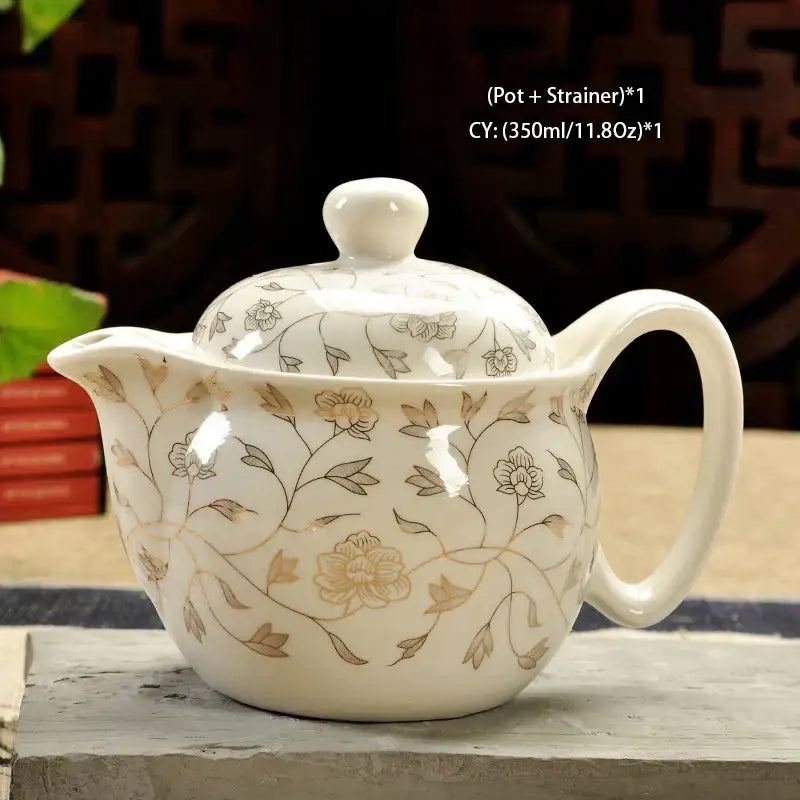 Handmade decorbites ceramic kung fu teapot in white with beige gray floral pattern and integrated strainer for tea brewing
