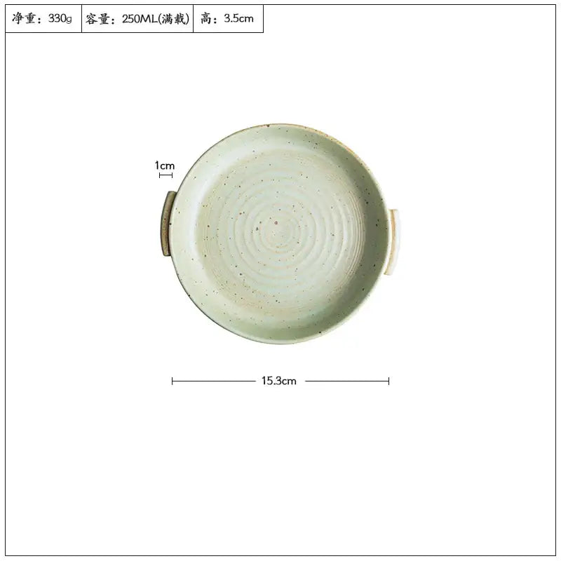 A handmade ceramic sushi plate in light green with speckles and handles, perfect for serving sushi