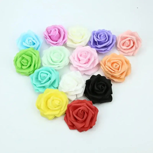 A collection of handmade colorful foam roses in pink purple green yellow red and black for wedding decor by decorbites foam roses