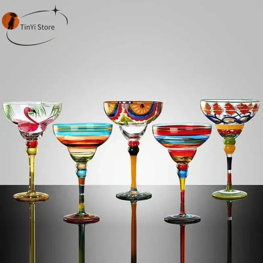 Hand-painted handmade colorful margarita wine glasses with vibrant designs and multicolored stems for dining room decorbites