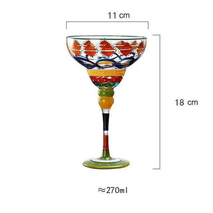 Hand-painted decorbites handmade colorful margarita glass with vibrant red blue and yellow patterns on clear glass