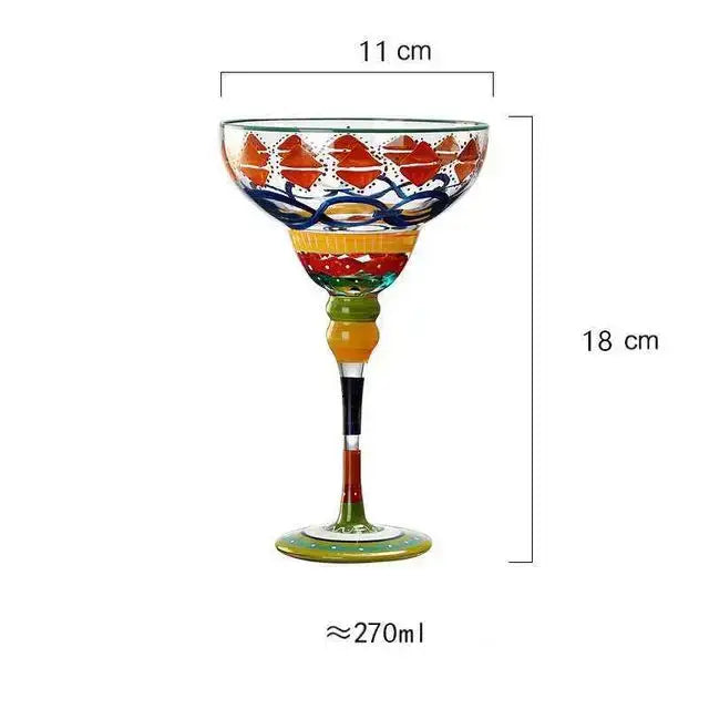 Hand-painted decorbites handmade colorful margarita glass with vibrant red blue and yellow patterns on clear glass