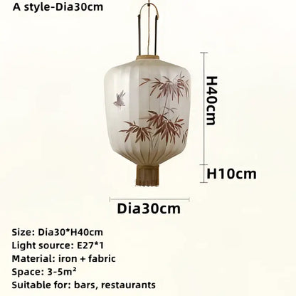 Handmade cream and peach bamboo lantern pendant with delicate bird illustrations crafted from iron and fabric decorbites bamboo lantern