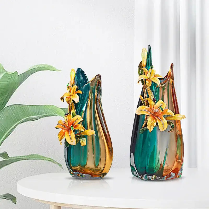 Two ornate decorbites handmade enamel vases in teal and amber with golden lilies and green gemstones for living room decor