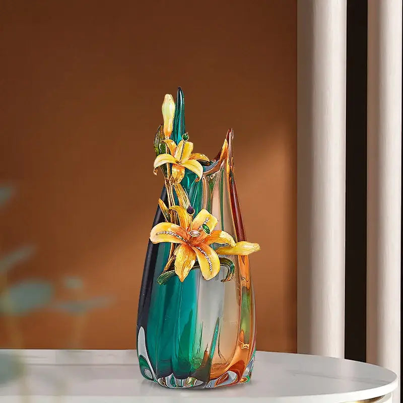 Handmade enamel vase in teal and amber with golden lily flowers featuring embedded gemstones for living room decorbites decor